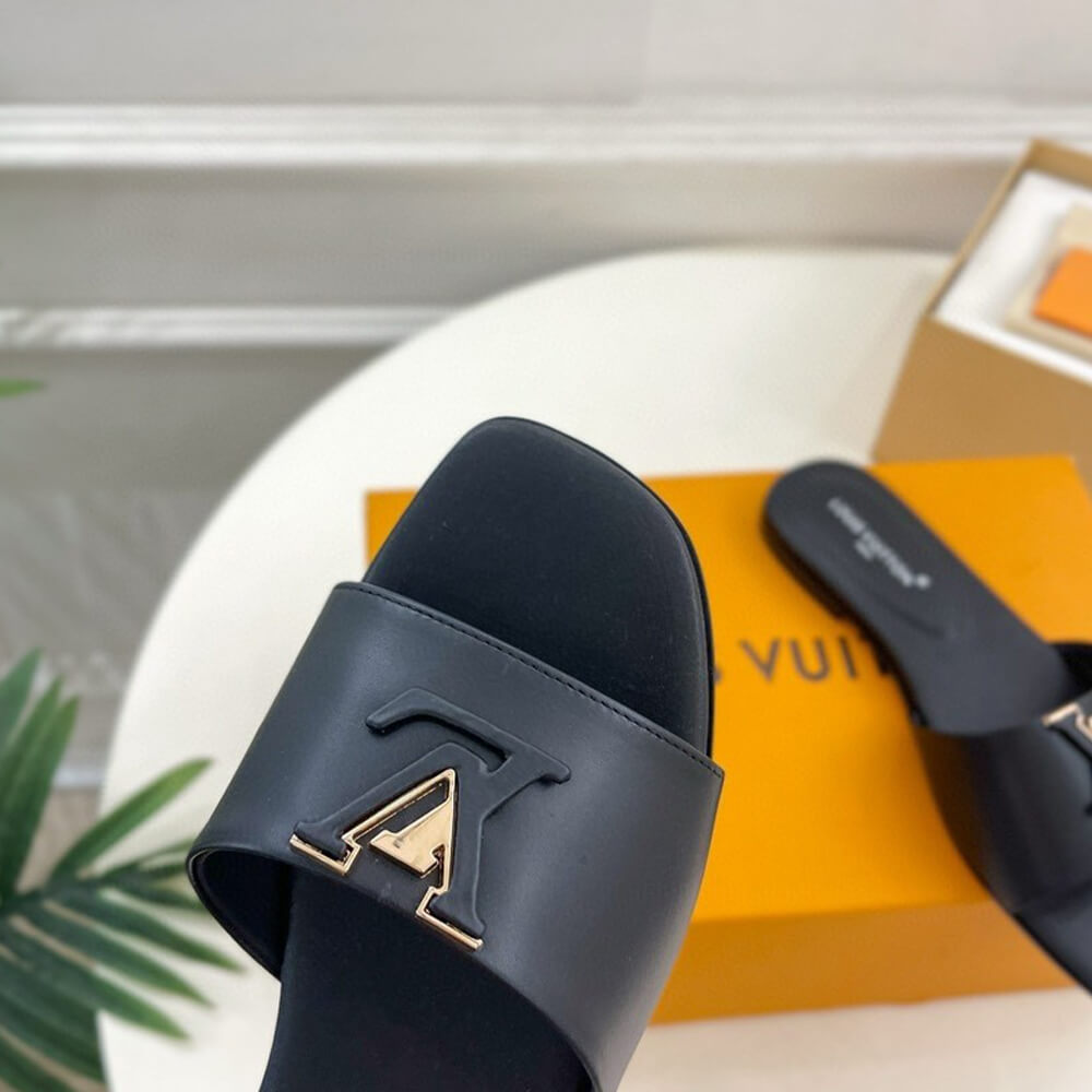 l**is V*t*n lv capri flat mule black